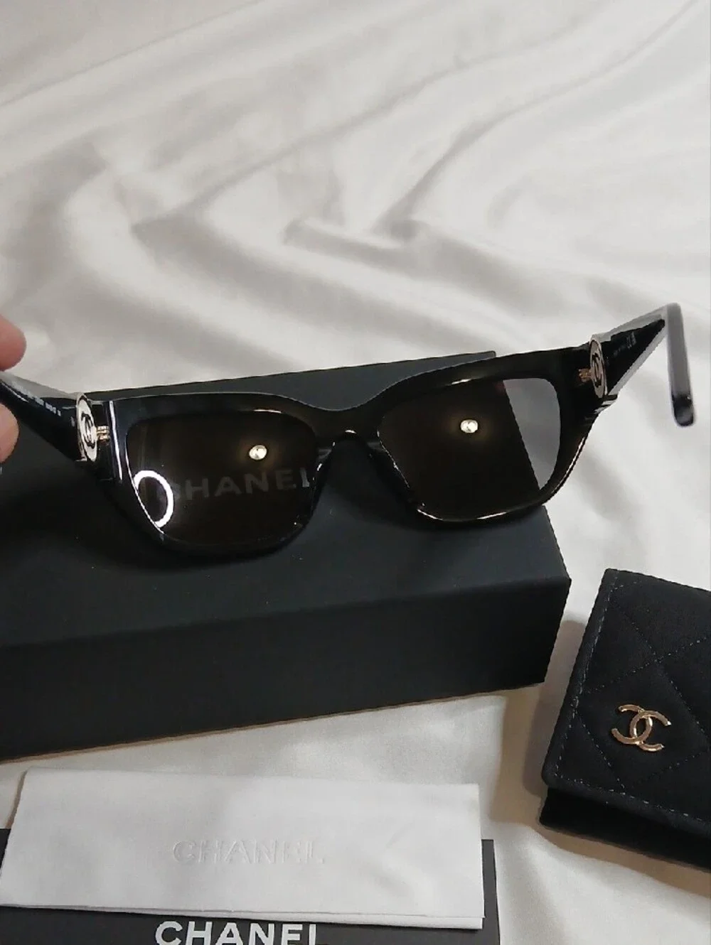 CHANEL Black Cat-Eye Sunglasses with White/Silver CC Emblem